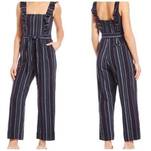 First Monday Stripe Ruffle Ankle Jumpsuit.